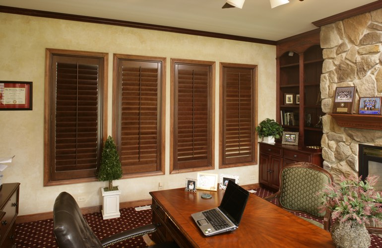 Hardwood plantation shutters in a Fort Myers home office
